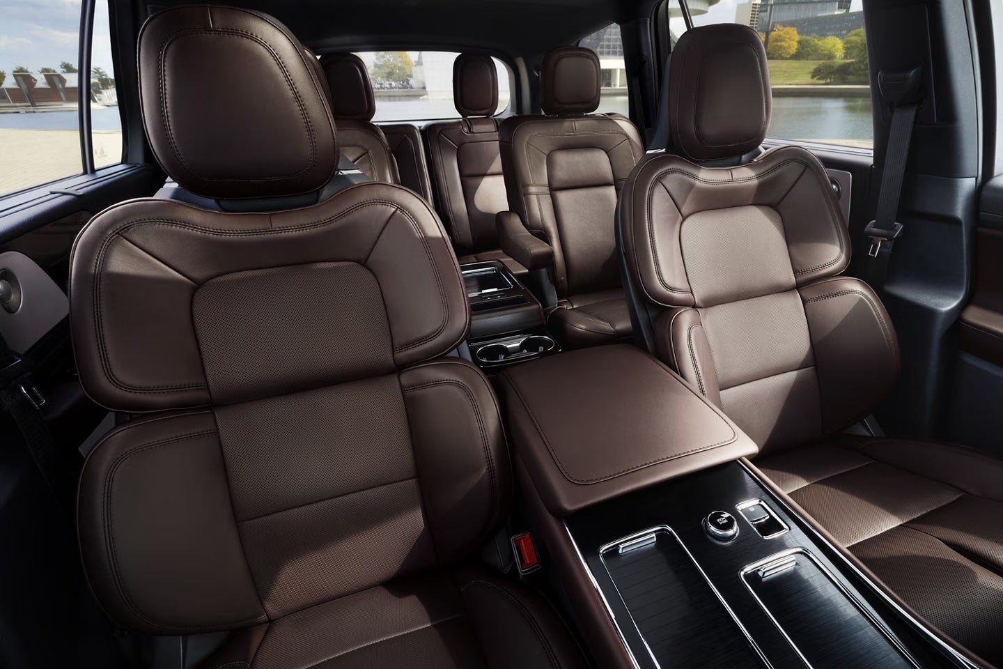 Three rows of seats in a car