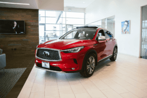 A Dynamic Sunstone Red INFINITI QX50 at the McGavock Dealership in Lubbock.