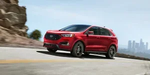 red 2022 ford edge on the road