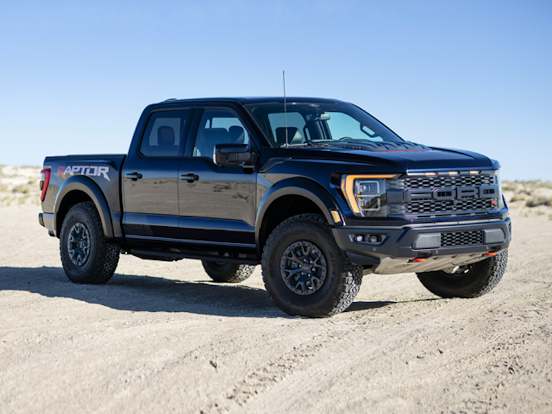 The 2024 Ford F-150 Raptor parked in a harsh desert landscape