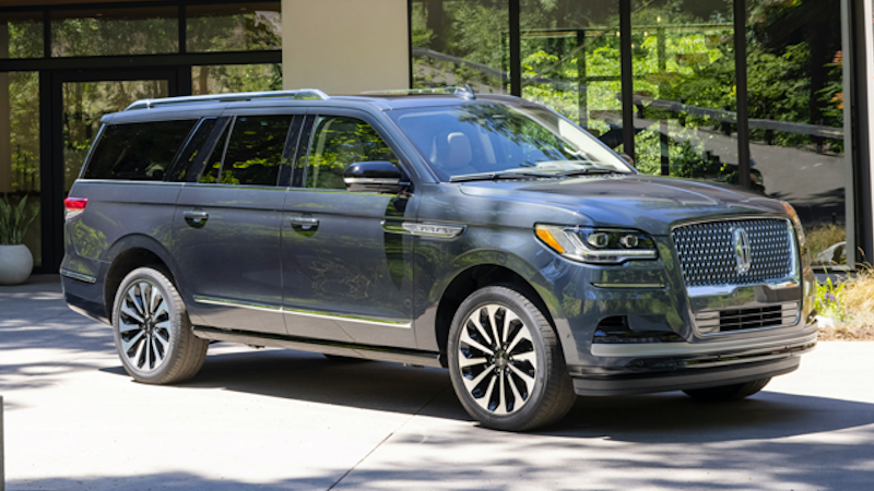 The 2024 Lincoln Navigator sitting in a luxury parkway