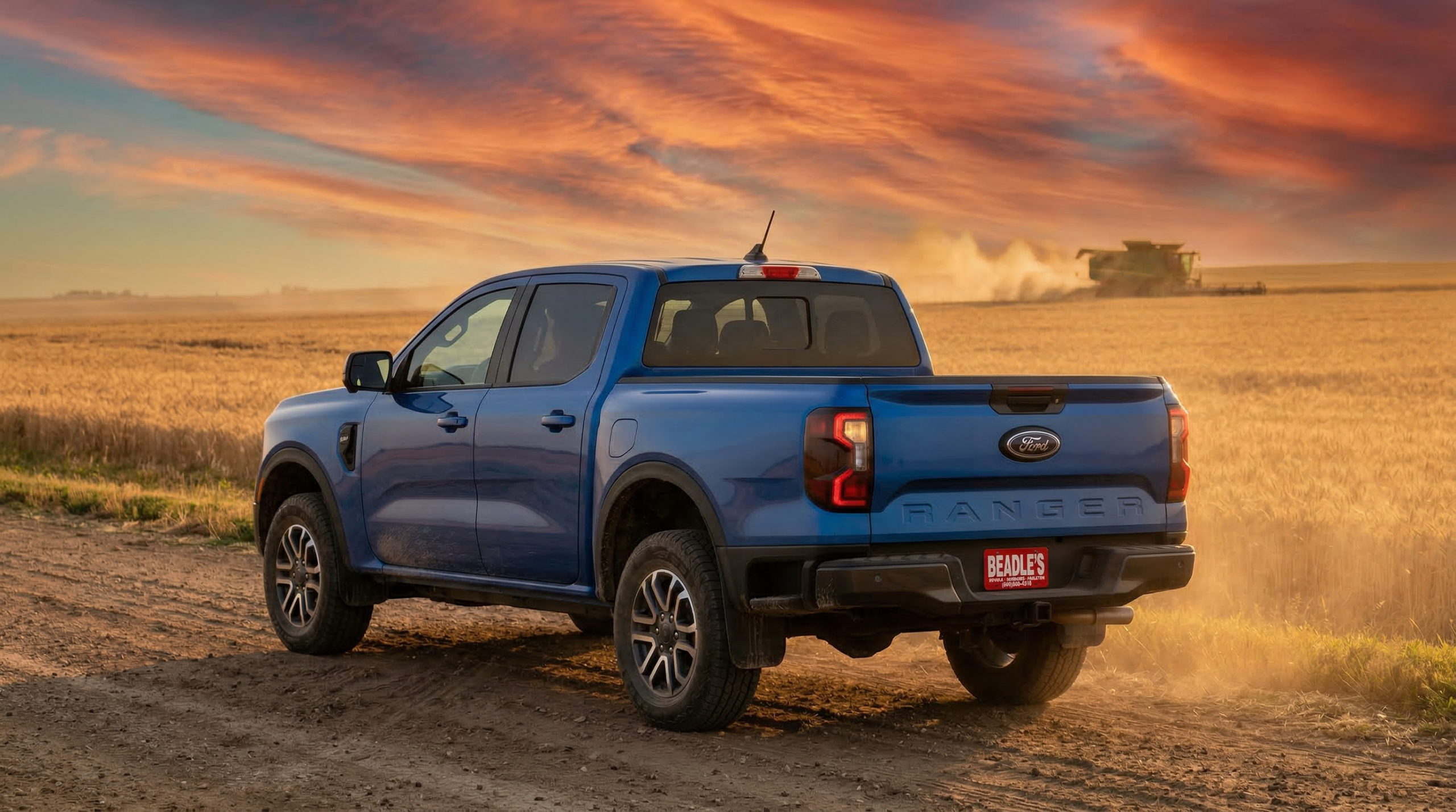 2026 Ford Ranger XLT parked beside South Dakota wheat fields during harvest sunset