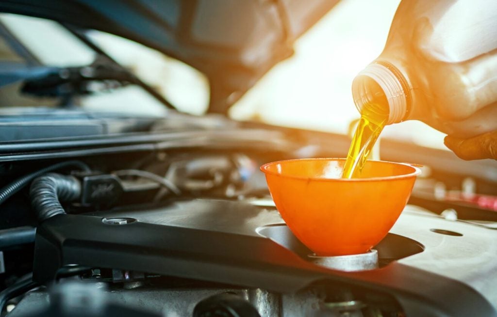 up close look of oil being changed