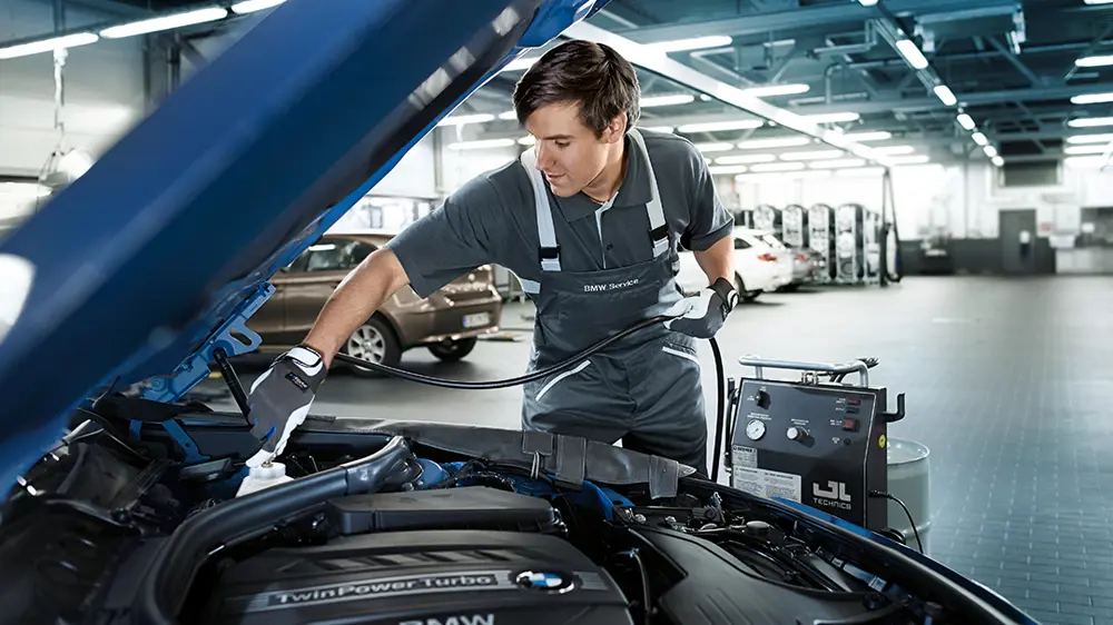 BMW engine components being serviced by a BMW-trained technician