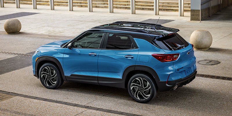 A blue Chevrolet Trailblazer parked in an urban environment.