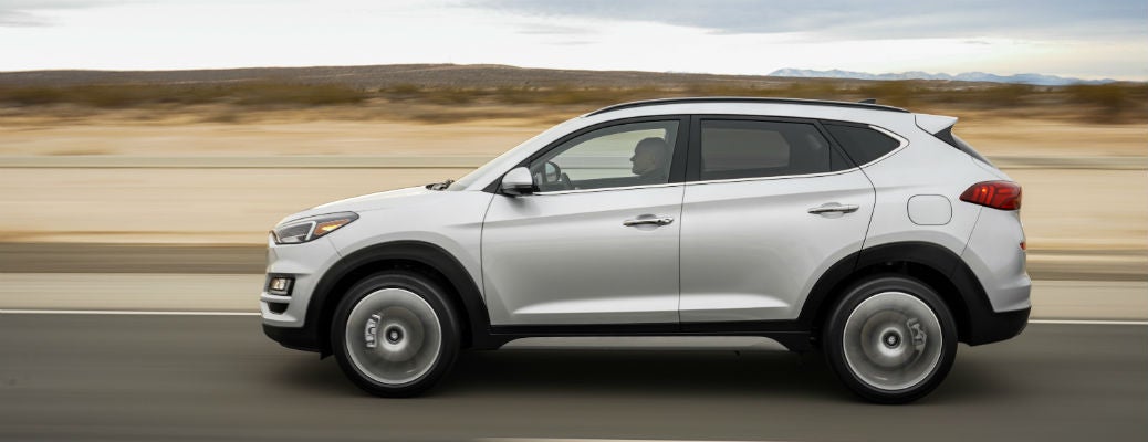 Side view of 2021 Hyundai Tucson driving