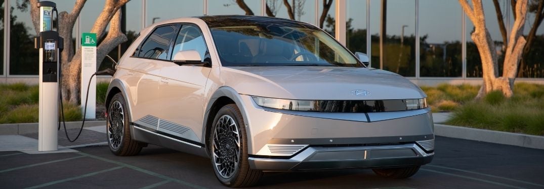 Silver 2022 Hyundai IONIQ 5 at a Charging Station