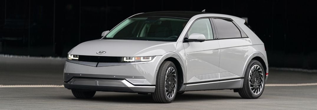White 2022 Hyundai IONIQ 5 on a City Street