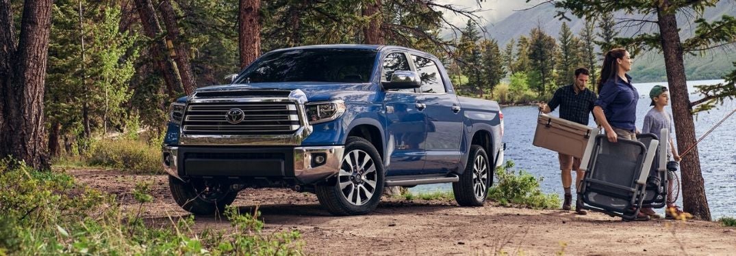 Blue 2020 Toyota Tundra and Family Next to a Lake