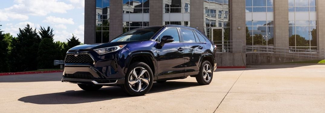 Blue 2021 Toyota RAV4 Prime in Front of an Office Ending