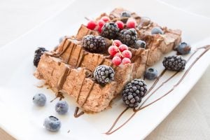 Chocolate ice cream with berries on top