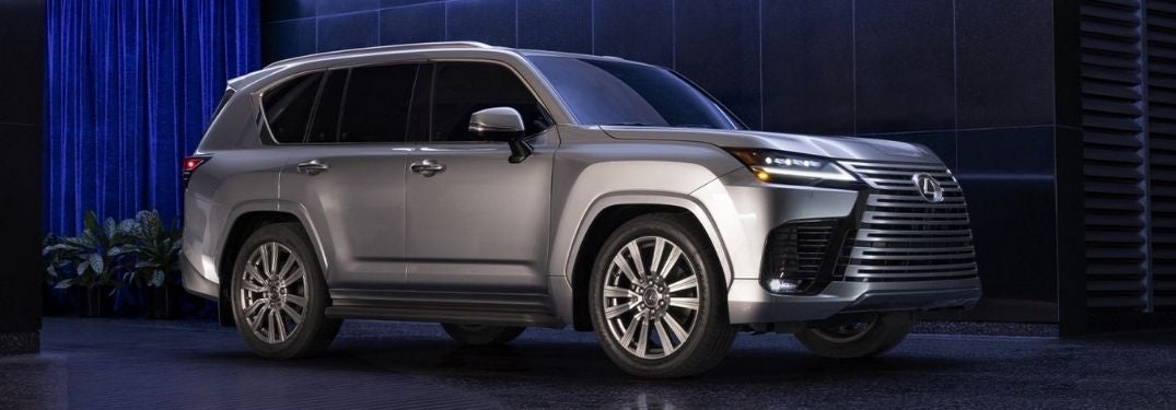 Silver 2022 Lexus LX on Dark City Street