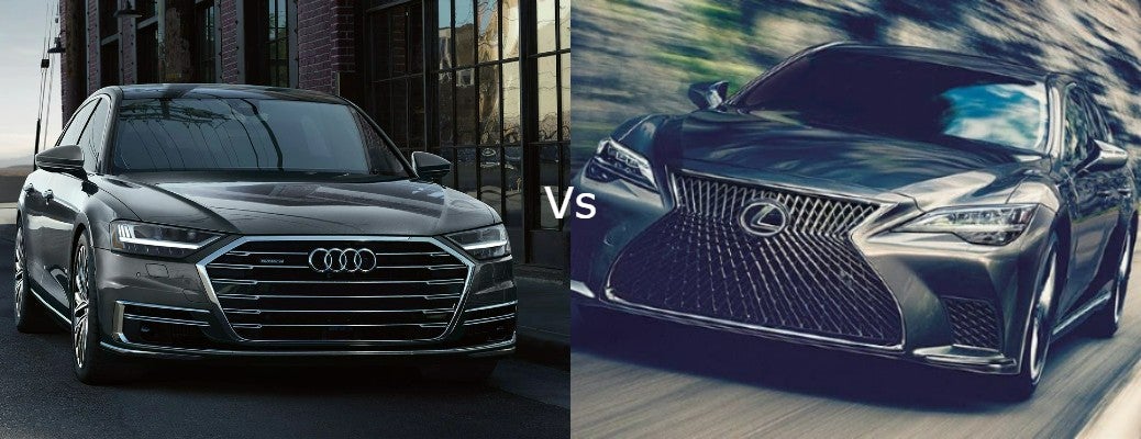 A 2021 Audi A8 head on view next to a 2022 Lexus LS head on view