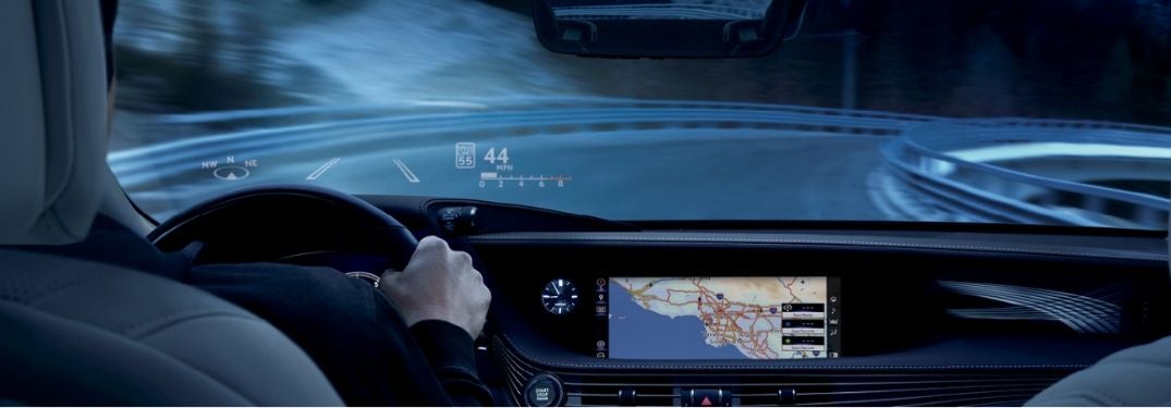 Man Driving a Lexus at Night with Color Head-Up Display