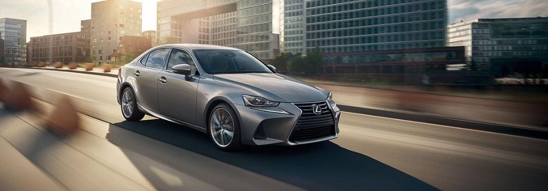 Silver 2021 Lexus IS on a City Freeway