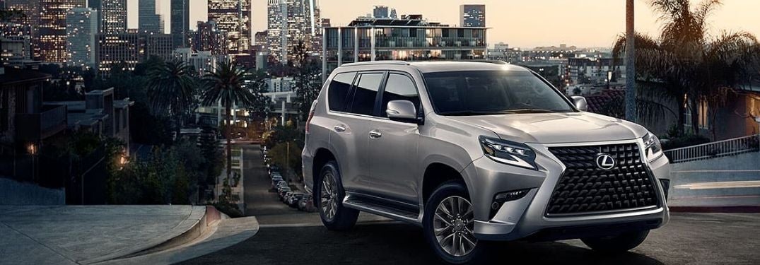 Silver 2020 Lexus GX in Front of City Skyline at Night