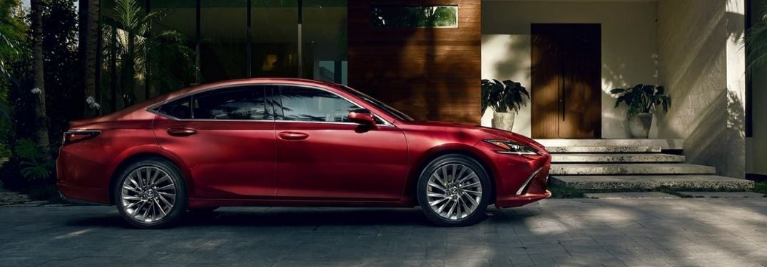 Red 2021 Lexus ES Hybrid Side Exterior on a City Street