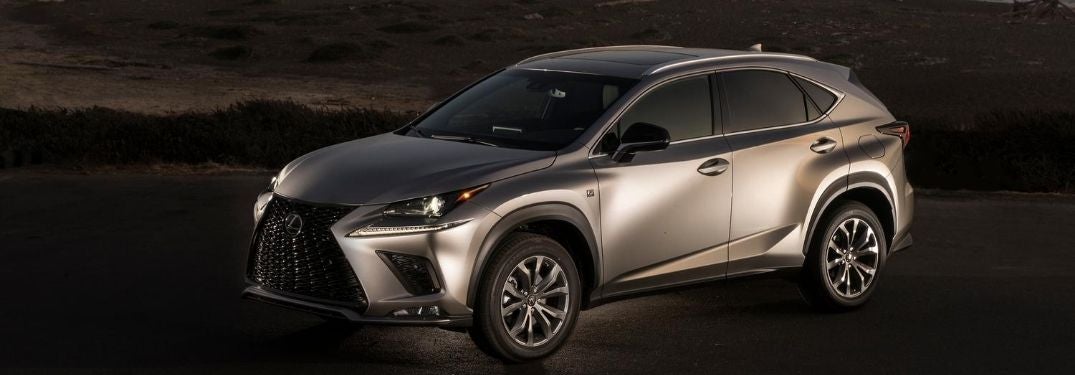 Silver 2021 Lexus NX Front Exterior at a Beach at Dusk