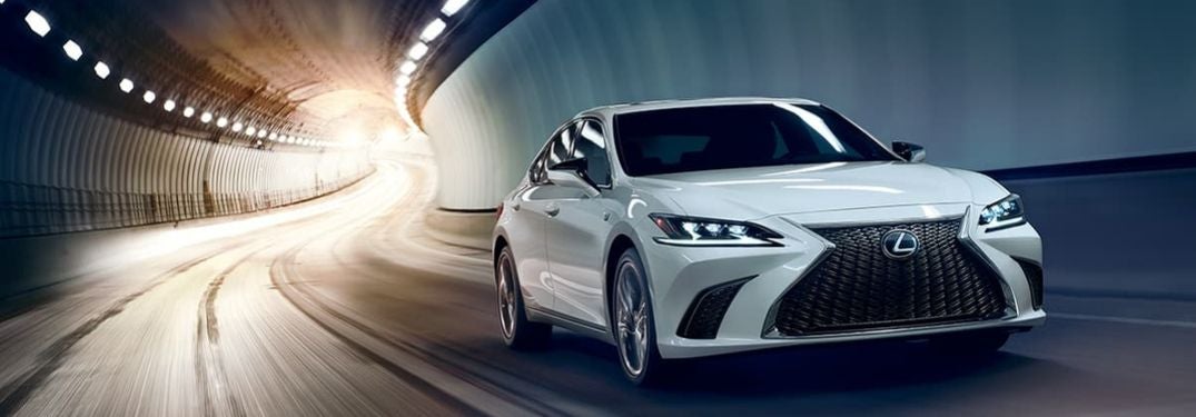 White 2020 Lexus ES F Sport Driving in a Tunnel