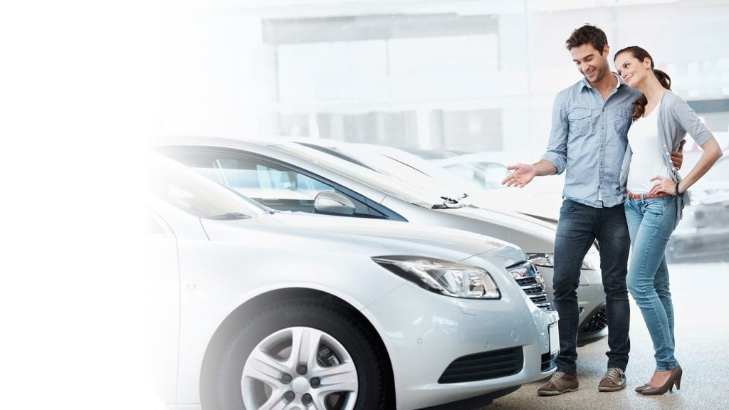 People at car dealership