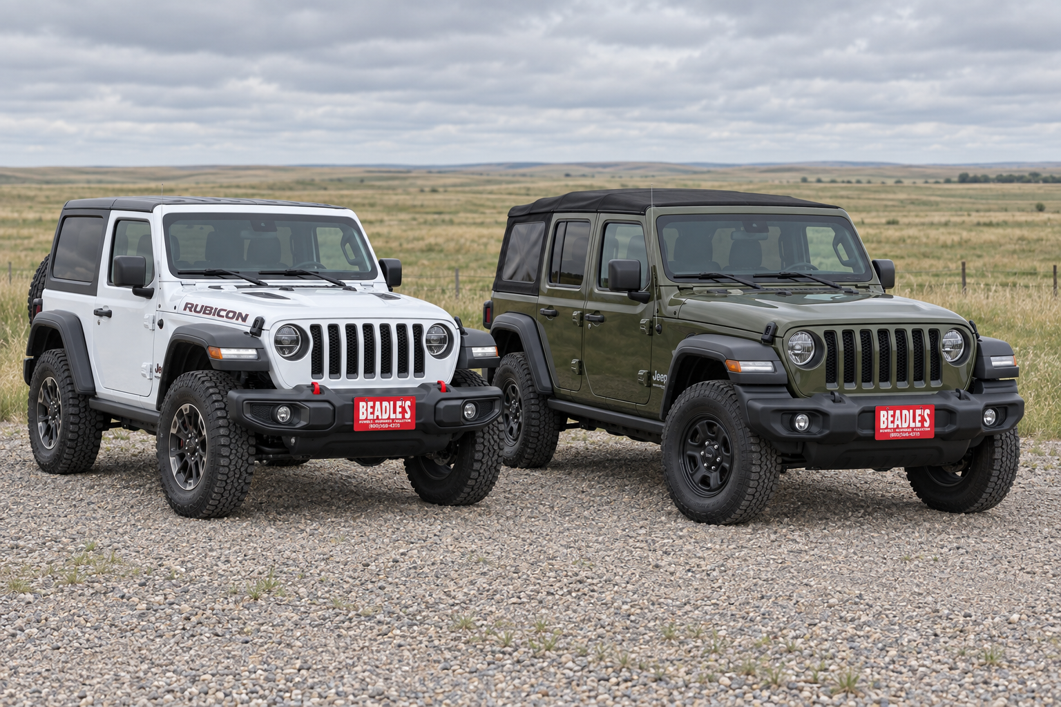 2-door Jeep Wrangler Rubicon and 4-door Wrangler Sport side by side on a gravel lot in South Dakota, at Beadle's Chrysler Center
