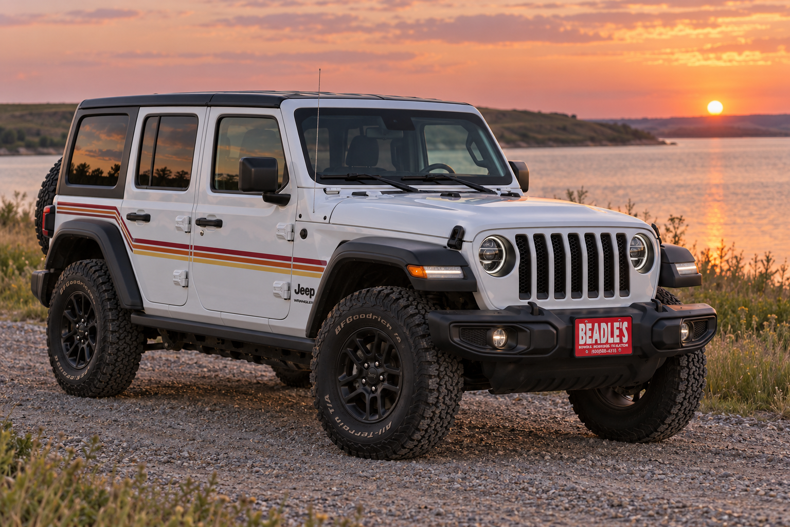 2027 Jeep Wrangler two-tone special edition parked at a South Dakota lake, at Beadle's Chrysler Center