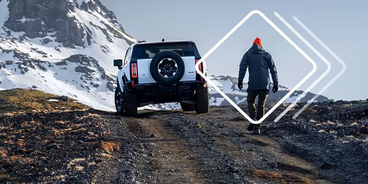 Man with GMC SUV outside