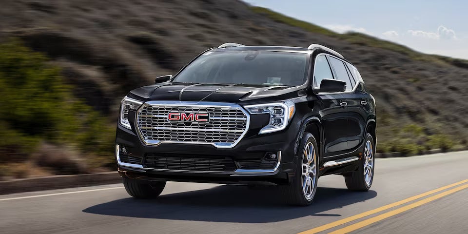 2024 GMC Terrain driving on the road