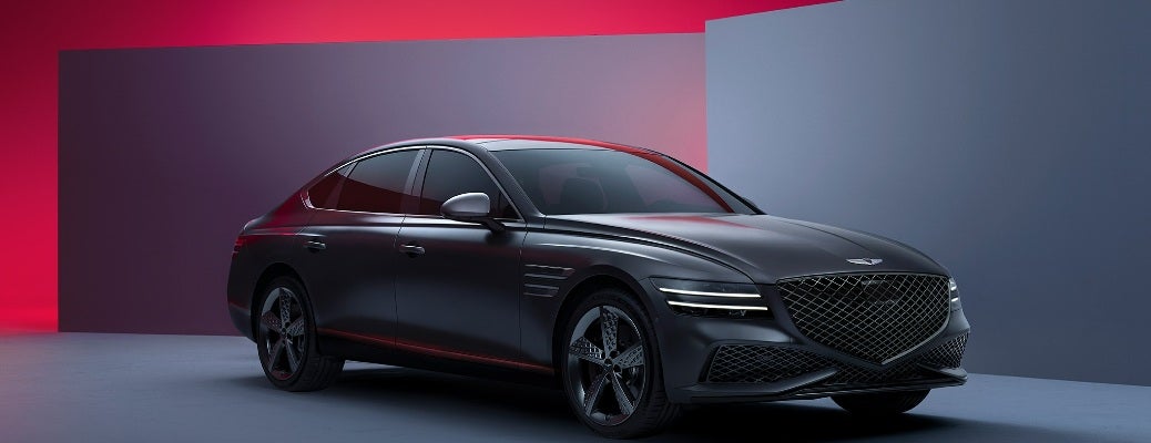 3/4 front view of a new 2022 Genesis G80 in a showroom environment