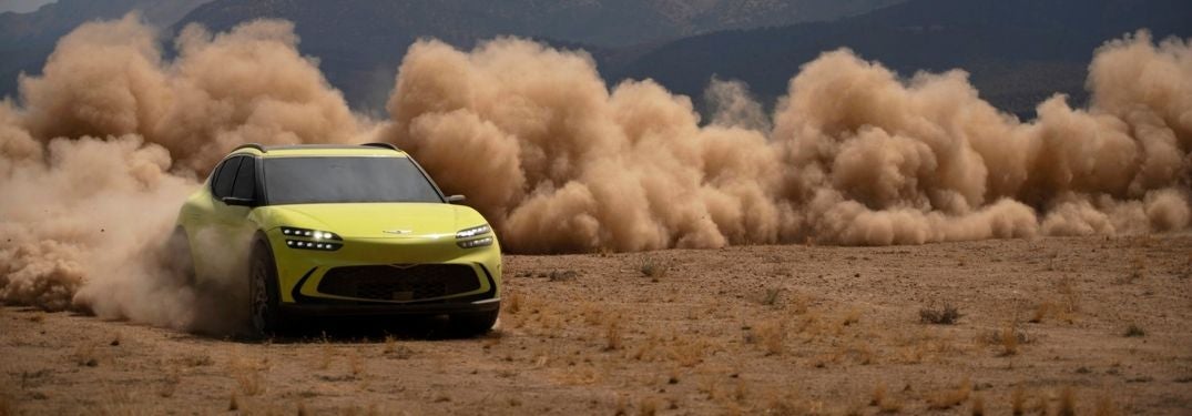 Neon Yellow 2023 Genesis GV60 Kicking Up Dust in the Desert