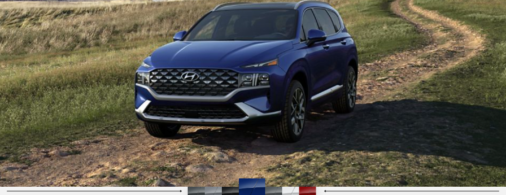 hyundai santa fe on dirt road with color palette