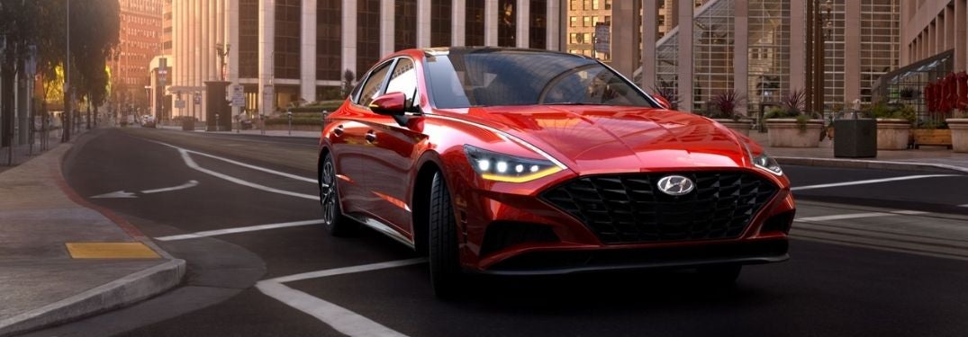 Red 2022 Hyundai Sonata Front Exterior on a City Street
