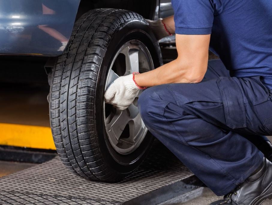 Person changing a tire