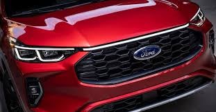 Front view of the Ford Escape Platinum showing the signature coast-to-coast LED light bar.