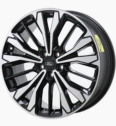 Close up of the new 19-inch Ebony-painted Machined-face Aluminum Wheels on the 2026 Ford Escape Platinum.