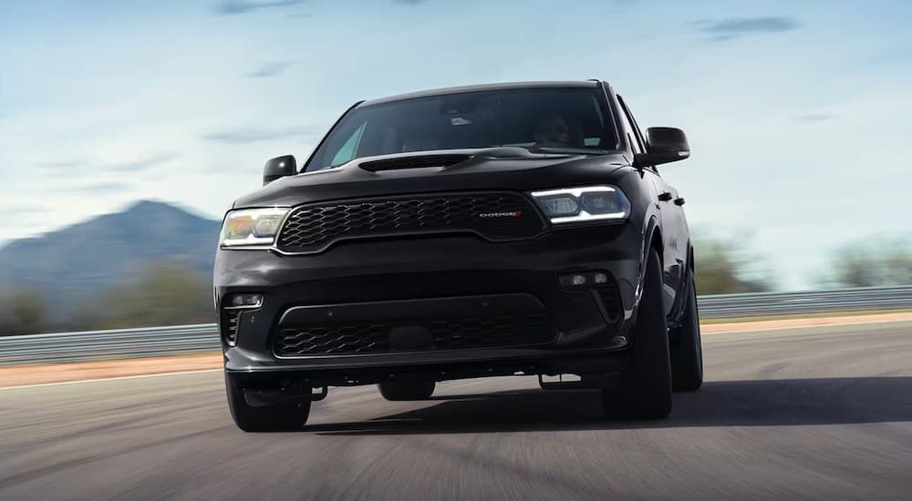 A black 2023 Dodge Durango is shown from the front after leaving a used Dodge dealer.