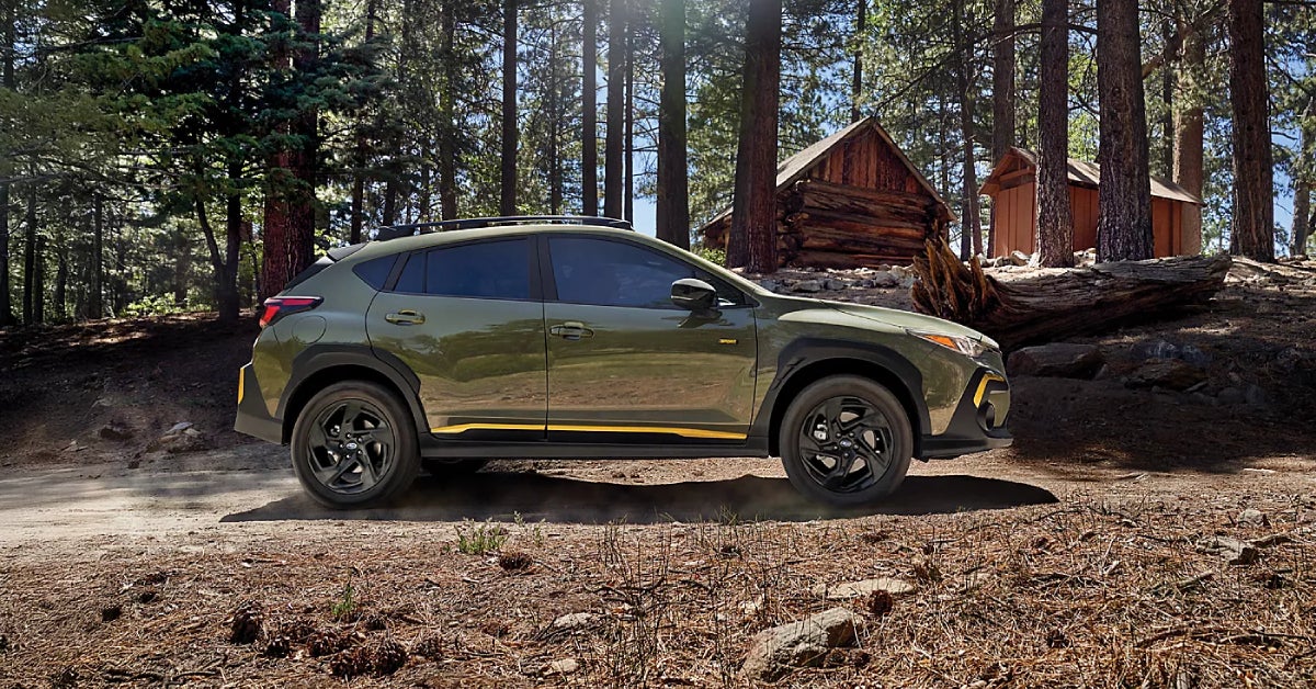 2025 Subaru Crosstrek in Alpine Green parked off road