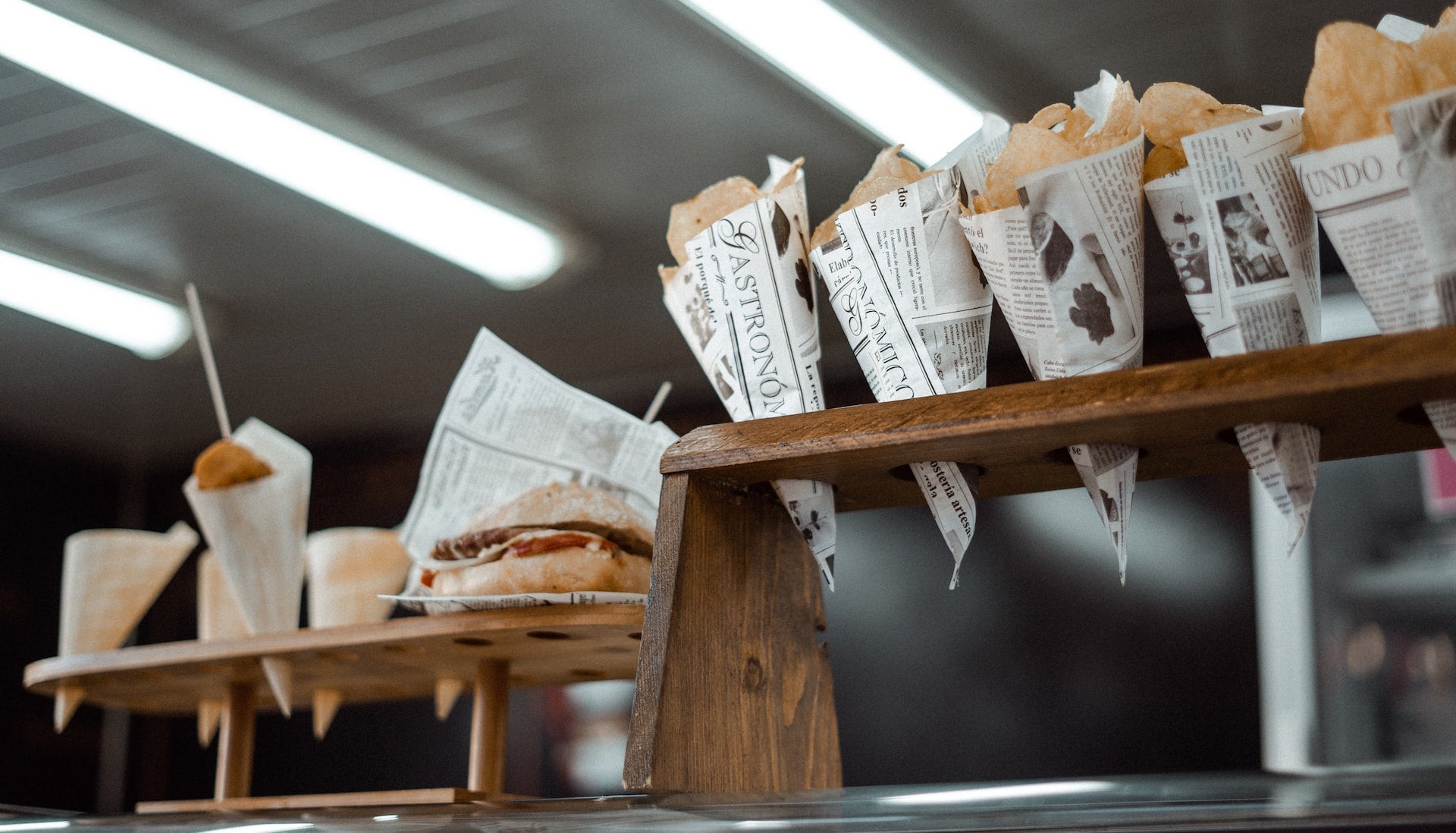 house made potato chips in a newspaper cone