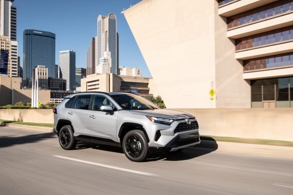 2022_Toyota_RAV4_SE Driving down the road grey