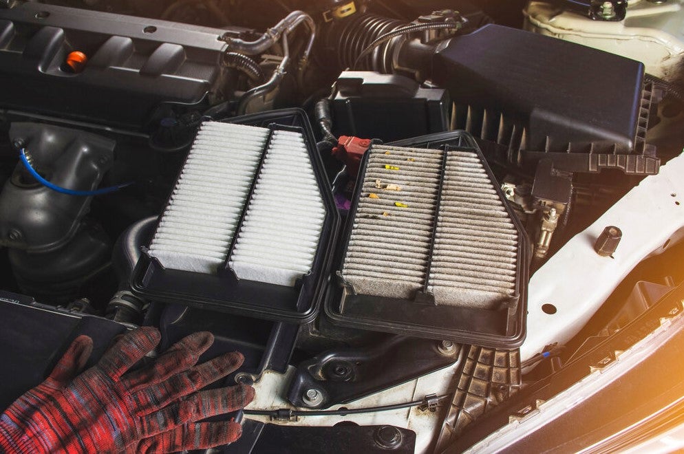 photo of a clean and dirty air filter showcasing when a filter should get maintenanced