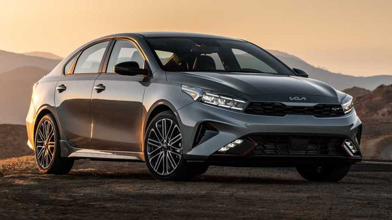 Silver 2024 Kia Forte parked at sunset