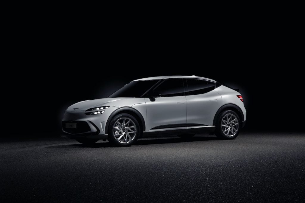 A white Hyundai in a black room