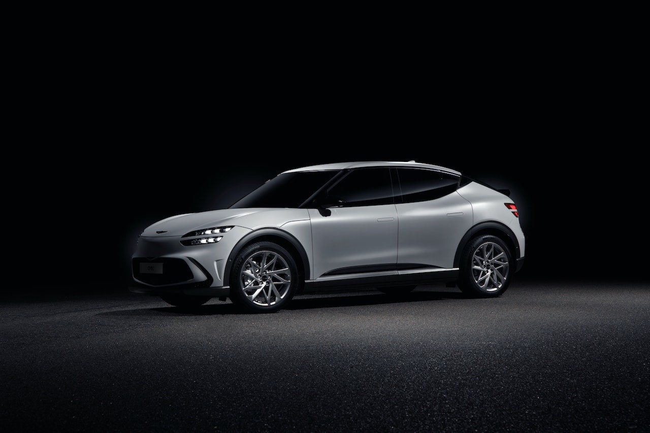 A white Hyundai in a black room