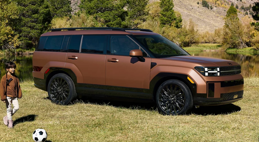 2025 Hyundai Santa Fe in brown paint parked in a field in Dublin, CA.