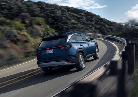 2025 Hyundai Tucson driving down a California highway.