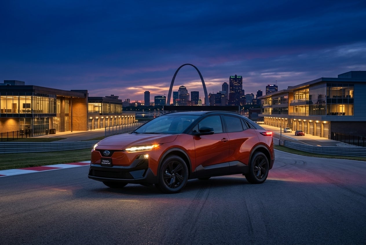 A scenic view of a fuel-efficient Subaru Crosstrek driving through the Missouri landscape, highlighting its modern design and aerodynamic profile.
