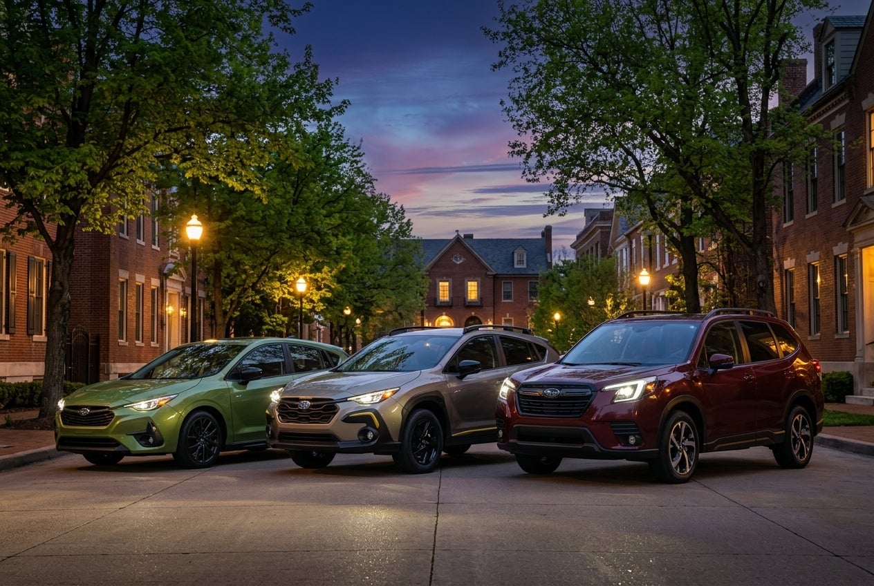 A comparison shot of the Subaru Crosstrek, Impreza, and Forester parked side-by-side, showcasing their diverse sizes yet shared commitment to aerodynamic efficiency.