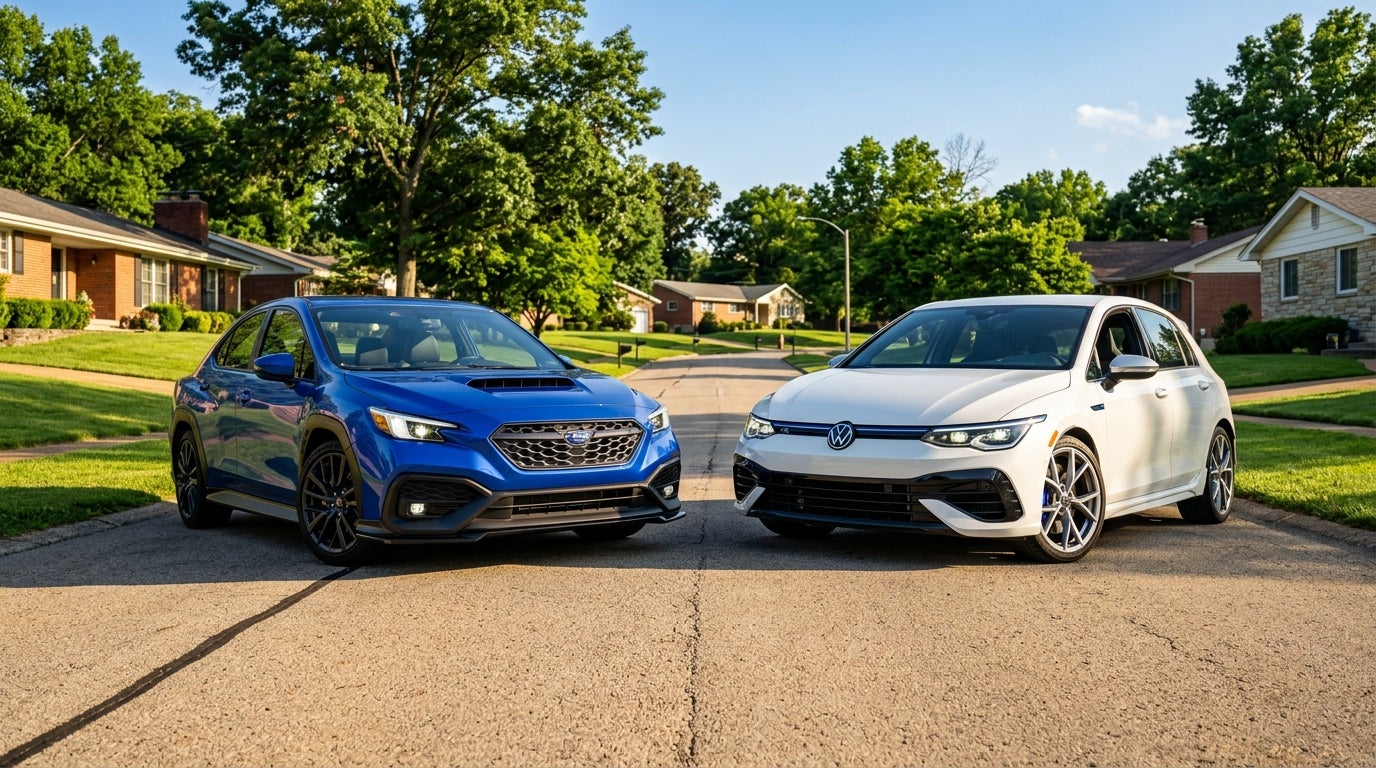 AI generated: Cinematic photography, eye level, a 2026 Subaru WRX in World Rally Blue and a white Volkswagen Golf R parked side-by-side on a clean asphalt road in Sunset Hills, Missouri, vibrant and saturated color palette, dramatic high contrast lighting from a low afternoon sun, June summer afternoon, clear blue sky with a few wispy clouds, suburban background with mature oak trees and rolling green lawns, realistic Missouri suburban neighborhood with mid-century brick homes and asphalt driveways, distant heat haze on the pavement, sharp focus on the aggressive front grilles and LED headlights, no people, clean and polished car bodies reflecting the bright sunlight, visceral and mechanical mood, professional automotive magazine style.