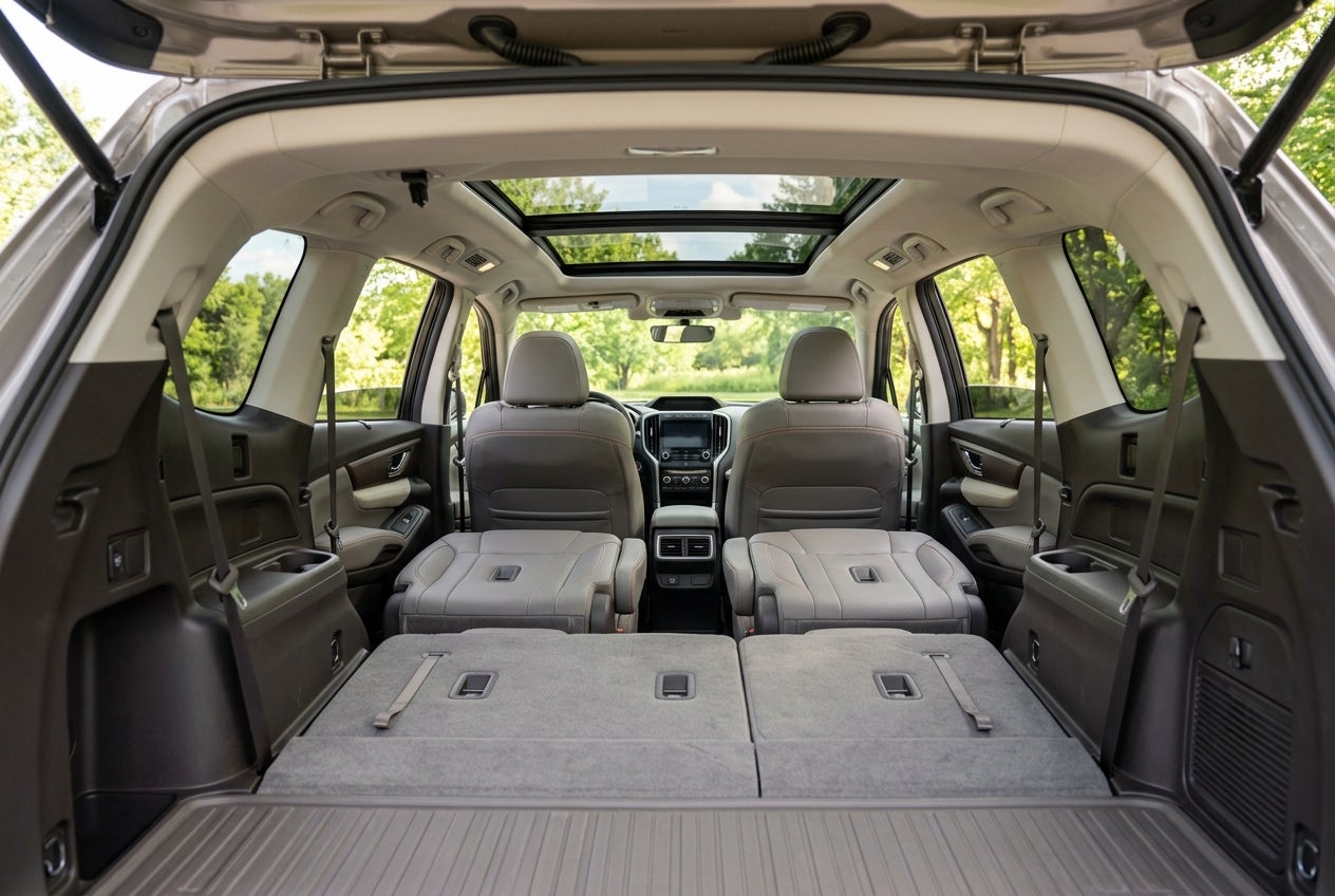 View from the open tailgate of a modern SUV showing spacious cargo area with rear seats folded flat. (Representative image for illustration purposes only. Actual vehicle may vary based on trim and configuration.)