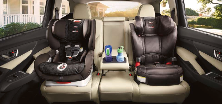 Unlimited Interior mid-major of Ascent 2nd-row bench seat with two child seats and props.